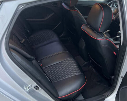 Серый Киа K5, объемом двигателя 2 л и пробегом 245 тыс. км за 9100 $, фото 4 на Automoto.ua