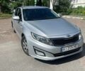 Серый Киа K5, объемом двигателя 2 л и пробегом 381 тыс. км за 7400 $, фото 1 на Automoto.ua