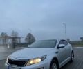 Серый Киа K5, объемом двигателя 2 л и пробегом 350 тыс. км за 7969 $, фото 1 на Automoto.ua