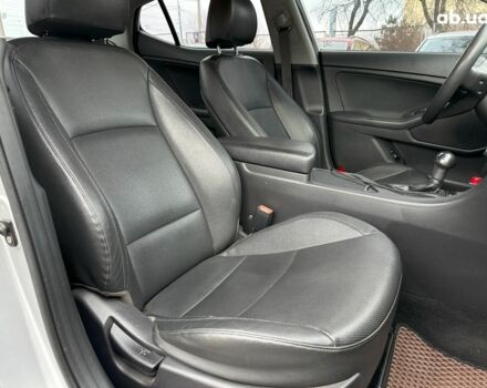 Серый Киа K5, объемом двигателя 2 л и пробегом 205 тыс. км за 10790 $, фото 31 на Automoto.ua