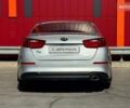 Серый Киа K5, объемом двигателя 2 л и пробегом 224 тыс. км за 10490 $, фото 6 на Automoto.ua