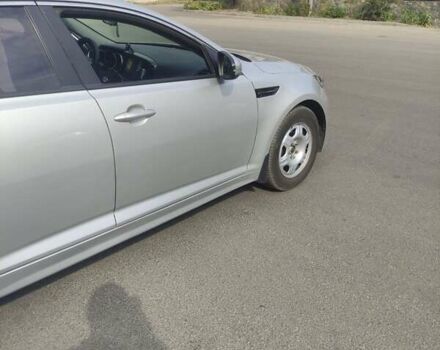 Серый Киа K5, объемом двигателя 2 л и пробегом 220 тыс. км за 9999 $, фото 3 на Automoto.ua