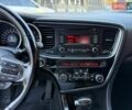 Серый Киа K5, объемом двигателя 2 л и пробегом 248 тыс. км за 9200 $, фото 2 на Automoto.ua