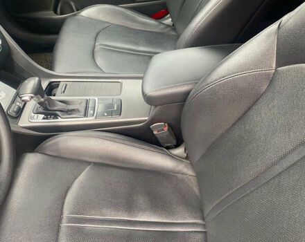 Серый Киа K5, объемом двигателя 2 л и пробегом 338 тыс. км за 12000 $, фото 16 на Automoto.ua