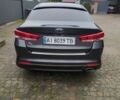 Серый Киа K5, объемом двигателя 2 л и пробегом 235 тыс. км за 11700 $, фото 1 на Automoto.ua
