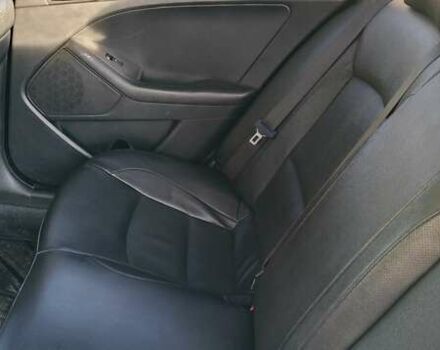 Серый Киа K5, объемом двигателя 2 л и пробегом 270 тыс. км за 8900 $, фото 8 на Automoto.ua