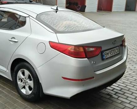 Серый Киа K5, объемом двигателя 2 л и пробегом 270 тыс. км за 8800 $, фото 4 на Automoto.ua