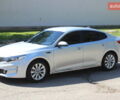 Серый Киа K5, объемом двигателя 2 л и пробегом 158 тыс. км за 14799 $, фото 1 на Automoto.ua