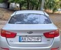 Серый Киа K5, объемом двигателя 2 л и пробегом 207 тыс. км за 8500 $, фото 1 на Automoto.ua