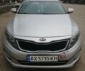 Серый Киа K5, объемом двигателя 2 л и пробегом 257 тыс. км за 8500 $, фото 1 на Automoto.ua