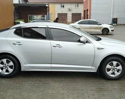 Серый Киа K5, объемом двигателя 2 л и пробегом 270 тыс. км за 8800 $, фото 2 на Automoto.ua