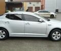 Серый Киа K5, объемом двигателя 2 л и пробегом 270 тыс. км за 8800 $, фото 2 на Automoto.ua