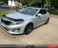 Серый Киа K5, объемом двигателя 2 л и пробегом 240 тыс. км за 10000 $, фото 1 на Automoto.ua