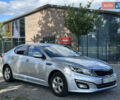 Серый Киа K5, объемом двигателя 2 л и пробегом 232 тыс. км за 10200 $, фото 1 на Automoto.ua