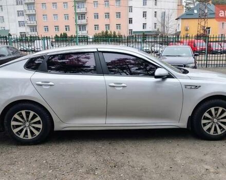 Серый Киа K5, объемом двигателя 2 л и пробегом 314 тыс. км за 10000 $, фото 7 на Automoto.ua