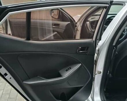 Серый Киа K5, объемом двигателя 2 л и пробегом 270 тыс. км за 8800 $, фото 13 на Automoto.ua