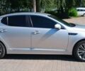 Серый Киа K5, объемом двигателя 2 л и пробегом 194 тыс. км за 12800 $, фото 2 на Automoto.ua