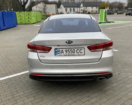 Серый Киа K5, объемом двигателя 2 л и пробегом 350 тыс. км за 10300 $, фото 4 на Automoto.ua