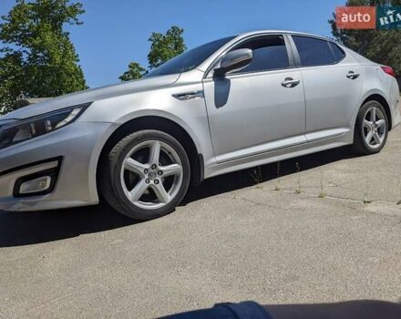 Серый Киа K5, объемом двигателя 2 л и пробегом 306 тыс. км за 9900 $, фото 3 на Automoto.ua
