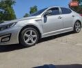 Серый Киа K5, объемом двигателя 2 л и пробегом 306 тыс. км за 9900 $, фото 3 на Automoto.ua
