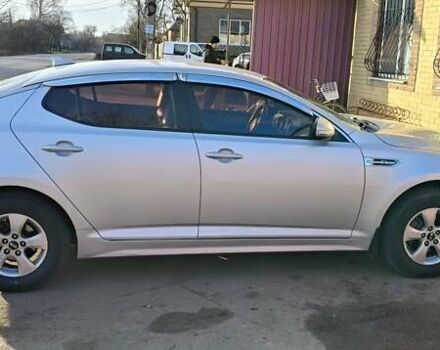 Серый Киа K5, объемом двигателя 2 л и пробегом 270 тыс. км за 8900 $, фото 2 на Automoto.ua