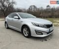 Серый Киа K5, объемом двигателя 2 л и пробегом 385 тыс. км за 8300 $, фото 1 на Automoto.ua