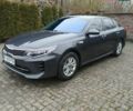 Серый Киа K5, объемом двигателя 2 л и пробегом 234 тыс. км за 12100 $, фото 1 на Automoto.ua