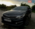 Серый Киа K5, объемом двигателя 2 л и пробегом 260 тыс. км за 11900 $, фото 1 на Automoto.ua