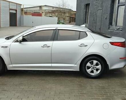 Серый Киа K5, объемом двигателя 2 л и пробегом 270 тыс. км за 8800 $, фото 5 на Automoto.ua