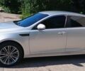 Серый Киа K5, объемом двигателя 2 л и пробегом 202 тыс. км за 10900 $, фото 1 на Automoto.ua