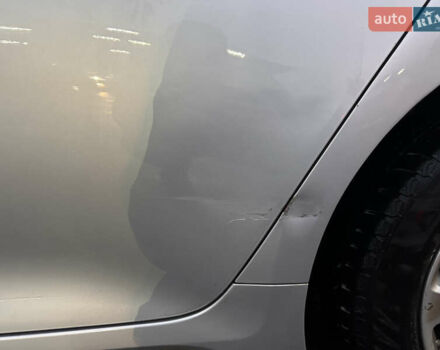 Серый Киа K5, объемом двигателя 2 л и пробегом 200 тыс. км за 11300 $, фото 18 на Automoto.ua