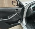 Серый Киа K5, объемом двигателя 2 л и пробегом 270 тыс. км за 8800 $, фото 7 на Automoto.ua