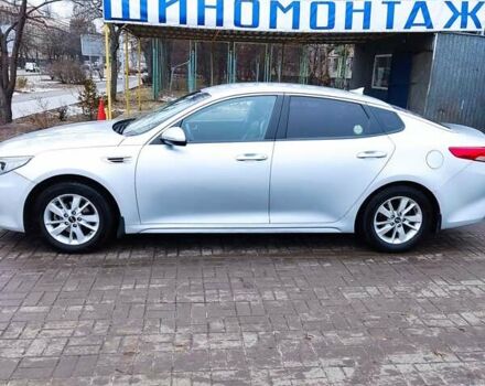 Серый Киа K5, объемом двигателя 2 л и пробегом 390 тыс. км за 9350 $, фото 1 на Automoto.ua