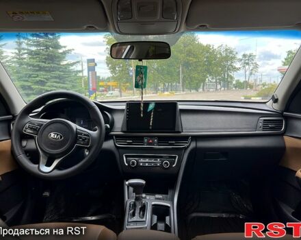 Серый Киа K5, объемом двигателя 2 л и пробегом 200 тыс. км за 9600 $, фото 11 на Automoto.ua