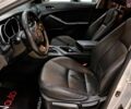 Серый Киа K5, объемом двигателя 2 л и пробегом 170 тыс. км за 8500 $, фото 12 на Automoto.ua