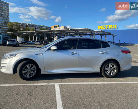 Серый Киа K5, объемом двигателя 2 л и пробегом 318 тыс. км за 10600 $, фото 5 на Automoto.ua