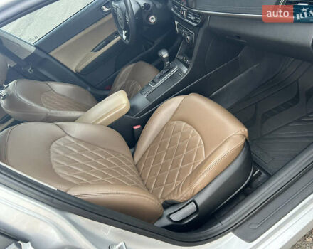 Серый Киа K5, объемом двигателя 2 л и пробегом 300 тыс. км за 10300 $, фото 6 на Automoto.ua