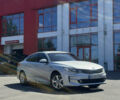 Серый Киа K5, объемом двигателя 2 л и пробегом 200 тыс. км за 12000 $, фото 1 на Automoto.ua