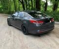 Серый Киа K5, объемом двигателя 2 л и пробегом 255 тыс. км за 12500 $, фото 1 на Automoto.ua