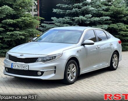 Серый Киа K5, объемом двигателя 2 л и пробегом 200 тыс. км за 9600 $, фото 2 на Automoto.ua