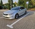 Серый Киа K5, объемом двигателя 2 л и пробегом 285 тыс. км за 13000 $, фото 1 на Automoto.ua