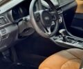 Серый Киа K5, объемом двигателя 2 л и пробегом 200 тыс. км за 9600 $, фото 9 на Automoto.ua