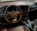 Серый Киа K5, объемом двигателя 2 л и пробегом 170 тыс. км за 8500 $, фото 13 на Automoto.ua