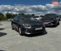 Серый Киа K5, объемом двигателя 2 л и пробегом 257 тыс. км за 12200 $, фото 2 на Automoto.ua