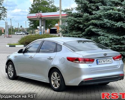 Серый Киа K5, объемом двигателя 2 л и пробегом 200 тыс. км за 9600 $, фото 6 на Automoto.ua