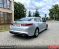 Серый Киа K5, объемом двигателя 2 л и пробегом 200 тыс. км за 9600 $, фото 4 на Automoto.ua