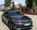 Серый Киа K5, объемом двигателя 2 л и пробегом 198 тыс. км за 13499 $, фото 1 на Automoto.ua