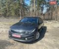 Серый Киа K5, объемом двигателя 2 л и пробегом 175 тыс. км за 12799 $, фото 1 на Automoto.ua