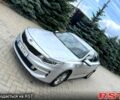 Серый Киа K5, объемом двигателя 2 л и пробегом 200 тыс. км за 9600 $, фото 1 на Automoto.ua