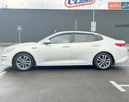 Серый Киа K5, объемом двигателя 2 л и пробегом 307 тыс. км за 8950 $, фото 7 на Automoto.ua